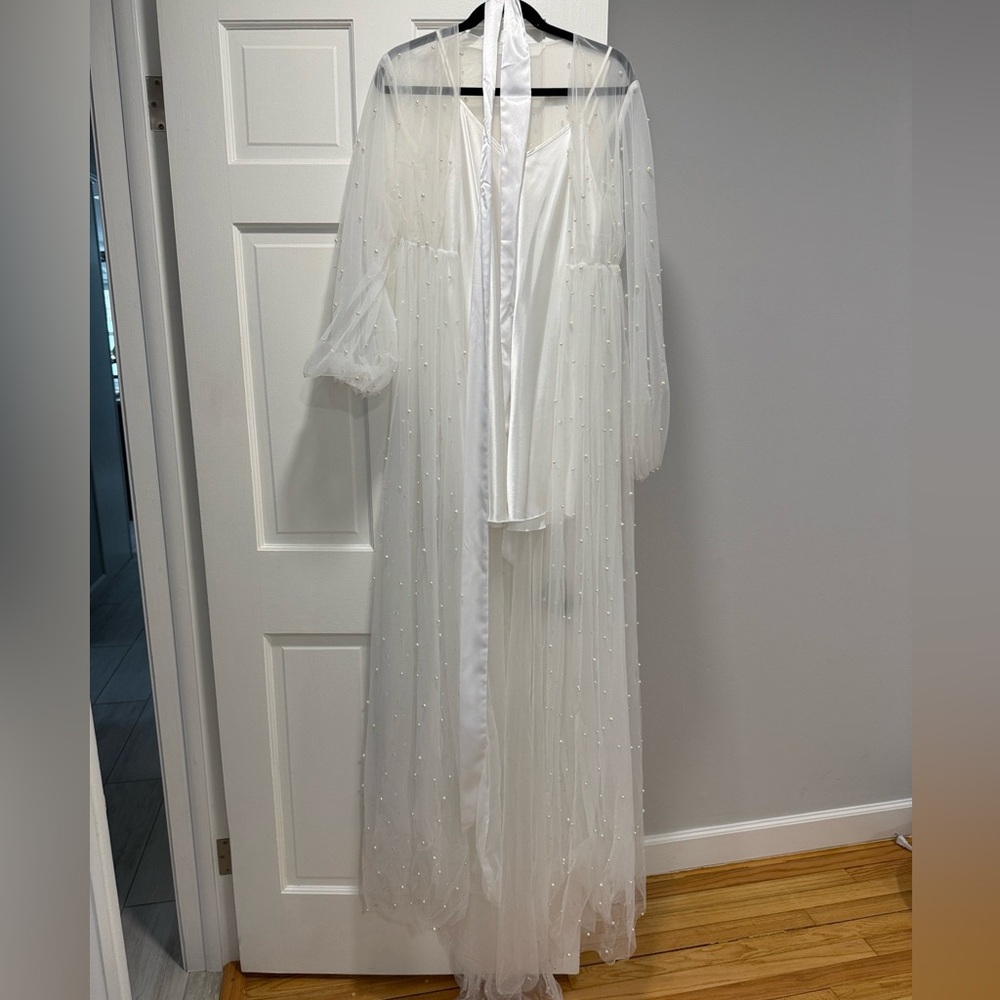 Elegant White Sheer Gown with Pearls